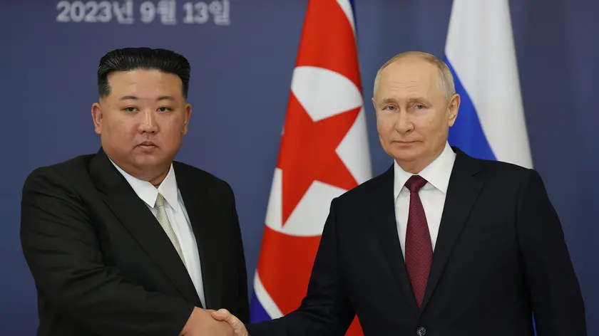 epa10857973 Russian President Vladimir Putin (R) shakes hands with North Korean leader Kim Jong Un (L) during their meeting on the Vostochny cosmodrome outside of the town of Tsiolkovsky (former Uglegorsk), some 180 km north of Blagoveschensk in Amur region, Russia, 13 September 2023. EPA/VLADIMIR SMIRNOV/SPUTNIK/KREMLIN POOL MANDATORY CREDIT