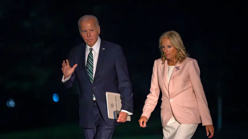 epa11548137 US President Joe Biden (L) and First Lady Jill Biden (R) arrive at the White House in Washington, DC, USA, on 13 August 2024. The President and First Lady traveled to New Orleans, Louisiana to attend at Biden Cancer Moonshot initiative event at Tulane University. EPA/BONNIE CASH / POOL