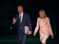 epa11548137 US President Joe Biden (L) and First Lady Jill Biden (R) arrive at the White House in Washington, DC, USA, on 13 August 2024. The President and First Lady traveled to New Orleans, Louisiana to attend at Biden Cancer Moonshot initiative event at Tulane University. EPA/BONNIE CASH / POOL