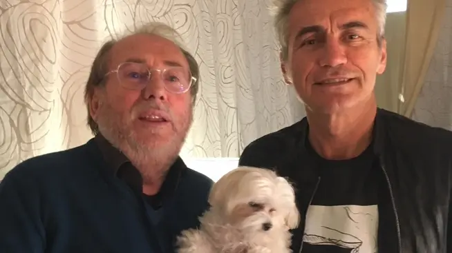 Loris Tramontin con l’inseparabile cagnolina “Mela” e Luciano Ligabue