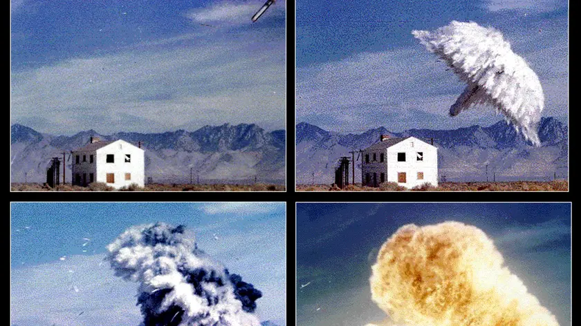 This four picture package obtained from the Federation of American Scientists 04 March 2002 shows a Fuel/Air Explosive (FAE) bomb exploding at an unidentified test site, which is a similar weapon to the BLU-118B thermobaric bomb being used by the US military. The BLU-118B is capable of penetrating deep underground to reach hidden command bunkers or caves, according to experts and defense officials. "It works as a combination of a shock wave and a fuel explosion," said Navy Lieutenant Commander Matthew Klee, a spokesman for the Central Command. "The first explosion spreads flammable aerosols through the underground complex. Then, the second ignites the fuel." Klee told AFP the bomb was among 80 pieces of ordnance dropped by US warplanes on the area where intelligence had discovered a concentration of Taliban and al-Qaeda fighters. According to independent experts, the bomb, once detonated, produces rapidly expanding shock waves flattening anything near the epicenter of the aerosol fuel cloud and is capable of causing extensive damage far beyond the immediate strike area. The shock waves produced by the BLU-118S are capable of navigating underground labyrinths and literally leaving no stone unturned, according to Klee. "When the shock wave from a normal bomb hits a wall it stops," said the spokesman. "With BLU-118, the shock wave goes around the corner." AFP PHOTO/Federation of Amercan Scientists