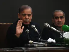 epa11150101 Pakistan's former prime minister and leader of the Pakistan Muslim League-Nawaz (PML-N) party Shehbaz Sharif (L) speaks during a press conference in Lahore, Pakistan, 13 Feburay 2024. PML-N president Shahbaz Sharif announced that the party will sit on the opposition benches if independent candidates form a government at the Centre. He stated that PML-N is in contact with PPP, MQM-P, and JUI parties and they will form an alliance under the leadership of Nawaz Sharif. EPA/RAHAT DAR