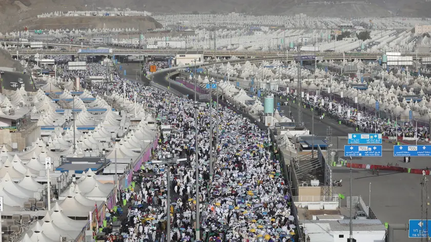 epa10719009 Muslim pilgrims arrive to perform the symbolic stoning of the devil ritual at the Jamarat Bridge during the Hajj pilgrimage near Mecca, Saudi Arabia, 30 June 2023. Pilgrims who are concluding the second day of Tashreeq, a two-to-three-day-stay in Mina valley, will leave the Jamarat area and head to Mecca for Farewell Tawaf. The Saudi Ministry of Hajj and Umrah announced on 27 June that the number of pilgrims performing this year's Hajj season has reached 1,845,045 from 150 countries. EPA/ASHRAF AMRA