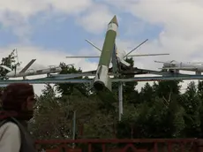 epa11137420 A person passes a display of mock Houthis-made drones and missile at a square in Sana'a, Yemen, 08 February 2024. The top leader of Yemen's Houthis, Abdul-Malik al-Houthi, said in a televised address, that his group had managed to stop the navigation of Israel-linked ships through the Bab al-Mandeb Strait, just hours after the United States Central Command (CENTCOM) attacked missiles from the Houthis that were ready to be launched against merchant ships in the Red Sea. The Houthis have kept up drone and missile attacks on ships in the Red Sea and the Gulf of Aden, with the aim of ending the Israeli bombardment of the Gaza Strip, and in response to US-led retaliatory strikes. In January 2024, the US Department of State designated Yemen's Houthis as a 'Specially Designated Global Terrorist group' due to their increased attacks on shipping lanes. In December 2023, the US Department of Defense announced a multinational operation to safeguard trade and protect ships in the Red Sea in response to the escalation of Houthi attacks. EPA/YAHYA ARHAB