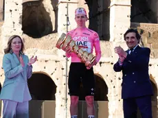 Italy's Prime Minister Giorgia Meloni, Slovenian rider Tadej Pogacar of Uae Team Emirates and Urbano Cairo celebrates with the trophy after winning of the Giro d'Italia 2024 cycling tour, in Rome, Italy, 25 May 2024