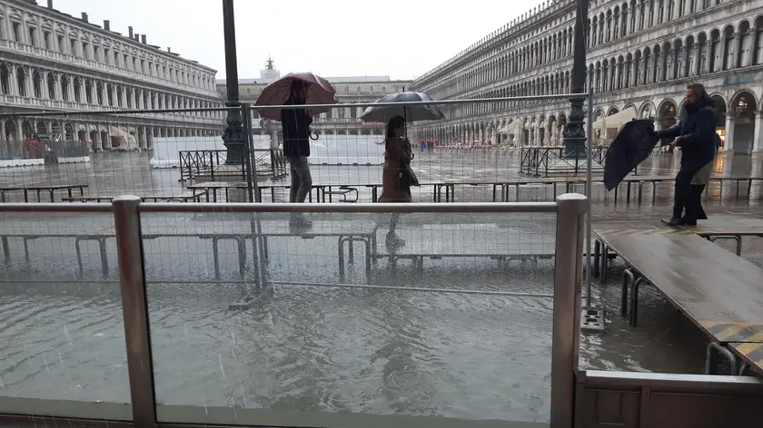Glass barriers (mini mose) defend St. Mark's Basilica from this morning's exceptional high tide in Venice, Italy, 22 November 2022. The high tide in Venice reached 173 centimeters above sea level in the Adriatic at 9.40 today, but was successfully stopped by the Mose bulkheads, which have been in operation since 2.00 today, on the three inlets. ANSA/ANDREA MEROLA