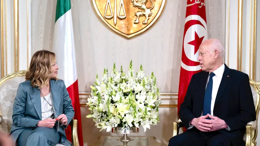 epa11283824 A handout photo made available by Chigi Palace shows Italian Prime Minister Giorgia Meloni (L) attending a meeting with Tunisian President Kais Saied at the Presidential Palace in Carthage, a residential suburb of Tunis, during her visit to Tunisia, 17 April 2024. Their bilateral meeting is expected to focus on the cooperation between the two countries in migration matters. EPA/PALAZZO CHIGI PRESS OFFICE/ FILIPPO ATTILI HANDOUT HANDOUT EDITORIAL USE ONLY/NO SALES HANDOUT EDITORIAL USE ONLY/NO SALES