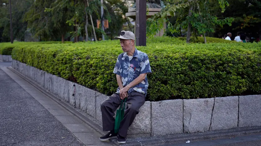 epa10867893 An elderly sits at Asakusa district in Tokyo, Japan, 18 September 2023, during the Respect for the Aged Day. According to data released by the government on 17 September, the number of people aged 80 and above reached 10 percent of Japan's population for the first time. EPA/FRANCK ROBICHON