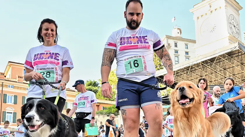 Alcuni dei partecipanti alla corsa a "sei zampe" della Maratonina di Udine (Foto Petrussi)