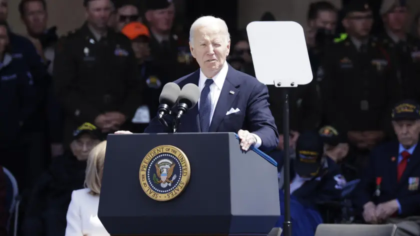 epa11393093 US President Joe Biden gives an speech during the commemorative ceremony for the 80th anniversary of D-Day landings in Normandy at American War Cemetery in Colleville-sur-Mer, France on 6 June 2024. More than 160.000 Western allied troops landed on beaches in Normandy on 6 June 1944 launching the liberation of Western Europe from Nazi occupation during World War II. EPA/ANDRE PAIN