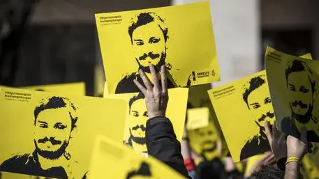 People hold signs depicting Giulio Regeni and reading ''365 days without Giulio'' as they attend a march in memory of the Italian researcher at Sapienza University on the first anniversary of his disappearance in Egypt, Rome, Italy, 25 January 2017. Italian President Sergio Mattarella on the same day called for cooperation to bring the killers of Regeni in Egypt to justice. 'Italy has mourned the killing of one of its studious young people, Giulio Regeni, without full light being shed on this tragic case for a year, despite the intense efforts of our judiciary and our diplomacy', Mattarella said on the first anniversary of Regeni's disappearance. 'We call for broader and more effective cooperation so that the culprits are brought to justice'. Guilio Regeni was an Italian PhD student researching the independent trade unions in Egypt, he disappeared on 25 January 2016 in Cairo, then his body was found in a ditch on Cairo-Alexandria road outside of Cairo on 03 February 2016 with signs of torture. ANSA/MASSIMO PERCOSSI