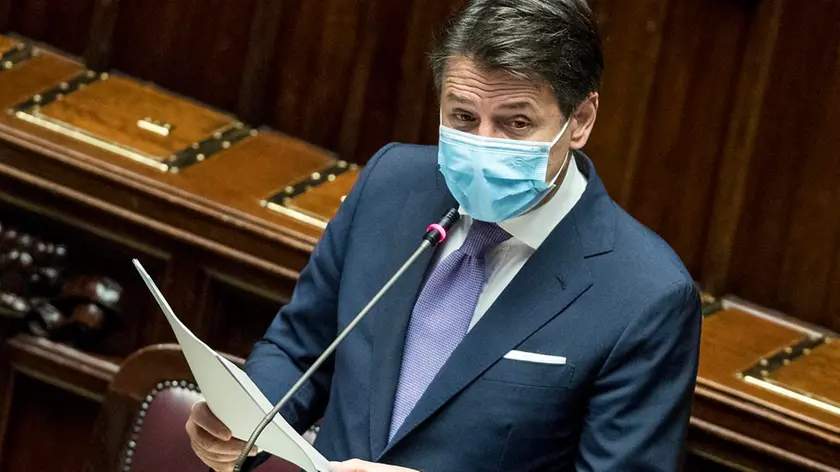 epa08764358 Italian Prime Minister Giuseppe Conte delivers a speech at the Lower House about the initiatives taken by the government against the Covid-19 emergency, in Rome, Italy, 22 October 2020. Giuseppe Conte told the Lower House that his government was ready to take further action if necessary amid a sharp rise in COVID-19 contagion in Italy. "We will be ready to intervene again if necessary," the premier said as he presented a package of new restrictions approved at the weekend to combat contagion. EPA/Roberto Monaldo / LaPresse / POOL