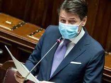 epa08764358 Italian Prime Minister Giuseppe Conte delivers a speech at the Lower House about the initiatives taken by the government against the Covid-19 emergency, in Rome, Italy, 22 October 2020. Giuseppe Conte told the Lower House that his government was ready to take further action if necessary amid a sharp rise in COVID-19 contagion in Italy. "We will be ready to intervene again if necessary," the premier said as he presented a package of new restrictions approved at the weekend to combat contagion. EPA/Roberto Monaldo / LaPresse / POOL