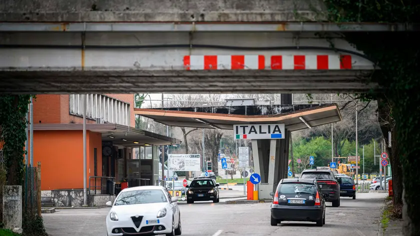A picture shows cars exiting and entering Slovenia at one of the former border crossings in Nova Gorica, on the Slovenian-Italian border, on March 10, 2020, as Italy is on a nationwide lockdown due to the outbreak of COVID-19, the new coronavirus. - With controls not yet put in place, Italians used the open border to Slovenia to do their usual shopping on March 10, despite Rome announcing travel restrictions the night before, and other measures to fight the coronavirus spread. Slovenia announced it would introduce border health checks, as well as closing some border crossings from March 12. Italy has been hit hardest in Europe by the new coronavirus with 9,172 cases, 463 deaths on March 10. (Photo by Jure Makovec / AFP)