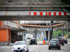 A picture shows cars exiting and entering Slovenia at one of the former border crossings in Nova Gorica, on the Slovenian-Italian border, on March 10, 2020, as Italy is on a nationwide lockdown due to the outbreak of COVID-19, the new coronavirus. - With controls not yet put in place, Italians used the open border to Slovenia to do their usual shopping on March 10, despite Rome announcing travel restrictions the night before, and other measures to fight the coronavirus spread. Slovenia announced it would introduce border health checks, as well as closing some border crossings from March 12. Italy has been hit hardest in Europe by the new coronavirus with 9,172 cases, 463 deaths on March 10. (Photo by Jure Makovec / AFP)