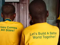 epa10434478 Students of Mawumadoka orphans and Less Privileged School wear school uniforms with inscriptions in a class in the school built with Bamboo materials in the Makoko riverine community in Lagos, Nigeria 27 January 2023. The founder of the school which began in August 2018, Joshua moved from his from his small space to his mother's parlour with 78 orphans to render humanitarian services and provide free education, free feeding, clothings, and edunation materials to children of the poor and underprivileged in the community. The school had run on charitable gifts from some non-governmental organisations, including churches and other religious organisations. EPA/Akintunde Akinleye