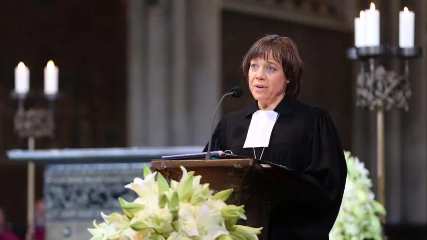 epa04708335 Annette Kurschus, praeses of the Evangelical Church of Westphalia, speaks during the memorial service for the victims of the Germanwings crash in the Cologne Cathedral in Cologne, Germany, 17 April 2015. German Chancellor Angela Merkel, foreign officials and religious leaders were attending the ecumenical service of national mourning in Cologne's historic cathedral that will also be telecast nationwide. The March 24 crash of flight 4U-9525 in the French Alps killed all 150 people on the Airbus jet. EPA/OLIVER BERG / POOL