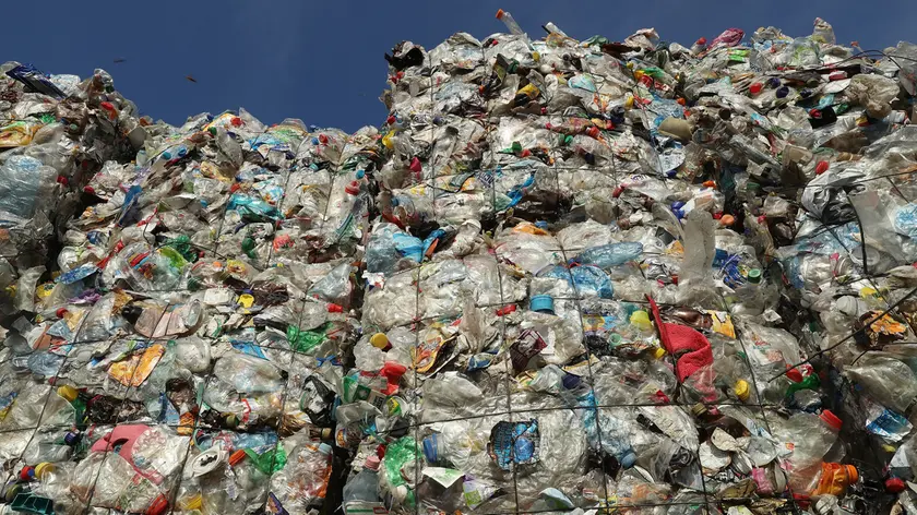 BERLIN, GERMANY - AUGUST 15: Bales of sorted plastic, much of it from drin containers, stand at the ALBA sorting center for the recycling of packaging materials on August 15, 2017 in Berlin, Germany. The facility sorts plastics, metals, films, wrappers, drink cartons and other waste people in Berlin discard as trash into recyclable raw materials that can later be used in industry and manufacturing. (Photo by Sean Gallup/Getty Images)