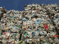 BERLIN, GERMANY - AUGUST 15: Bales of sorted plastic, much of it from drin containers, stand at the ALBA sorting center for the recycling of packaging materials on August 15, 2017 in Berlin, Germany. The facility sorts plastics, metals, films, wrappers, drink cartons and other waste people in Berlin discard as trash into recyclable raw materials that can later be used in industry and manufacturing. (Photo by Sean Gallup/Getty Images)