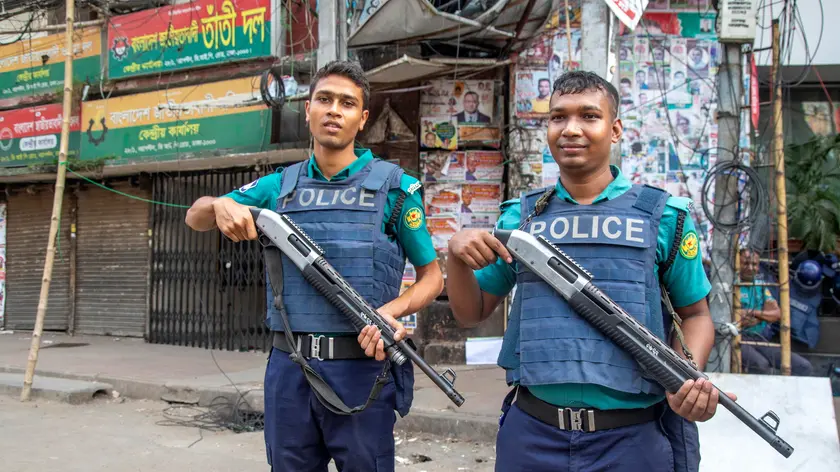 epa10952469 Bangladesh armed police officers stand guard in front of the Bangladesh Nationalist Party's office during the second day of a three-day nationwide blockade in Dhaka, Bangladesh, 01 November 2023. Bangladesh Nationalist Party (BNP) is protesting the recent arrest of their leaders and activists including secretary general Mirza Fakrul Islam Alamgir, and the death of party activists, in order to urge their one-point demand of immediate resignation of the ruling government. EPA/MONIRUL ALAM