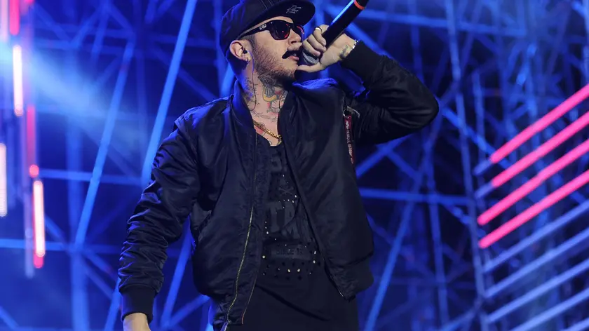 Emis Killa, durante la 25ma edizione del ''Concerto del Primo Maggio'' di Cgil, Cisl e Uil in Piazza San Giovanni in Laterano, Roma, 1 Maggio 2015. ANSA/GIORGIO ONORATI