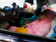 epa08321073 Bangladesh Nationalist Party (BNP) chairperson Begum Khaleda Zia sits inside a car after her release from Bangabandhu Sheikh Mujib Medical University in Dhaka, Bangladesh, 25 March 2020. Bangladesh government decided to release ailing Khaleda Zia for six months on humanitarian grounds on the condition of receiving treatment at home and not travelling abroad. Khaleda was serving a prison sentence of a total of 17 years in two graft cases. EPA/MONIRUL ALAM