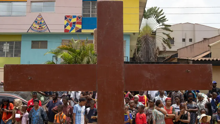 epa11249633 Worshippers follow members of the St Francis Catholic church during the Station of the Cross procession on Good Friday in Ikeja, Lagos, Nigeria, 29 March 2024. Christians of the Catholic and Western Christian churches around the world on 29 March this year commemorate Good Friday, the day when, according to the Bible, Jesus was crucified by the Romans in Jerusalem. EPA/EMMANUEL ADEGBOYE