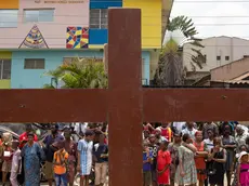 epa11249633 Worshippers follow members of the St Francis Catholic church during the Station of the Cross procession on Good Friday in Ikeja, Lagos, Nigeria, 29 March 2024. Christians of the Catholic and Western Christian churches around the world on 29 March this year commemorate Good Friday, the day when, according to the Bible, Jesus was crucified by the Romans in Jerusalem. EPA/EMMANUEL ADEGBOYE