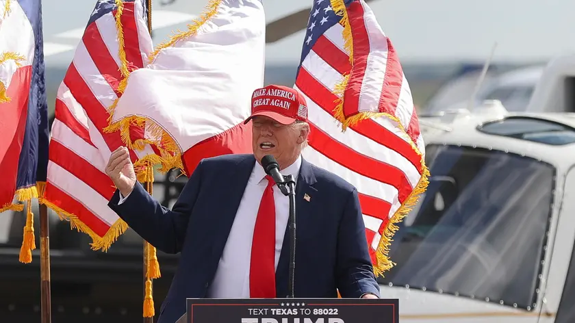 epa10985325 Former US President Donald Trump speaks at the South Texas International Airport in Edinburg, Texas, USA, 19 November 2023. This is another stop of Donald Trumps election campaign tour for presidency in 2024. EPA/ADAM DAVIS