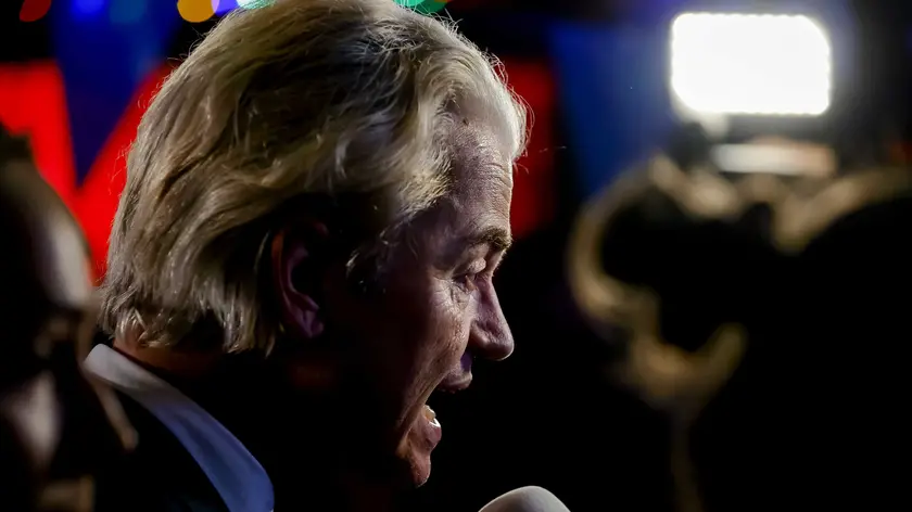 epa10990084 PVV leader Geert Wilders talks to media as he responds to the results of the House of Representatives elections in Scheveningen, Netherlands, 22 November 2023. Dutch voters headed to the polls on 22 November to elect the members of the House of Representatives and a new prime minister, after Netherlands' longest-serving prime minister, Mark Rutte's cabinet collapsed in July. EPA/REMKO DE WAAL