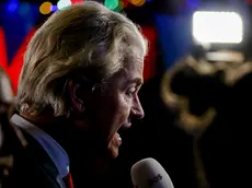 epa10990084 PVV leader Geert Wilders talks to media as he responds to the results of the House of Representatives elections in Scheveningen, Netherlands, 22 November 2023. Dutch voters headed to the polls on 22 November to elect the members of the House of Representatives and a new prime minister, after Netherlands' longest-serving prime minister, Mark Rutte's cabinet collapsed in July. EPA/REMKO DE WAAL