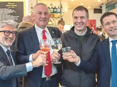 La festa per l'elezione di Alessandro Basso, secondo da sinistra (foto Brisotto / Petrussi), a destra la gioia di Luca Fasan, trionfatore a Monfalcone
