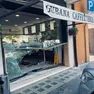 La vetrata in frantumi del bar panificio Del Foro a Cividale