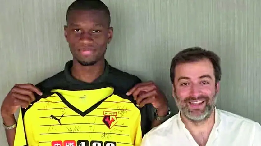 Il manager franco-persiano Mogi Bayat assieme a Christian Kabasele ai tempi del Watford