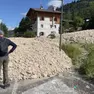 Davanti alla colata di sassi e fango che ha invaso l’Alemagna