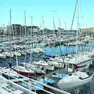 La barche a vela che riempiono lo specchio di mare della Sacchetta a Trieste