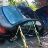 L'auto rimasta in bilico sul muretto a Cordenons