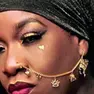La cantante caraibica Jeneile Osborne, in arte Queen Omega