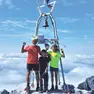 Renato Scodeller con i figli: a destra sulla cima del monte Coglians