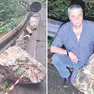 Rocce contro il guardrail, a destra il sindaco di Lusevera con uno dei massi franati sulla strada
