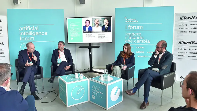 I relatori del panel sul lavoro: da sinistra Roberto Siagri, Marco Bentivogli, Maria Fusilli, Tommaso Nannicini