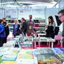 Lo stand degli editori del Fvg e, in alto, l’assessore regionale Anzil con Alberto Frappa Raunceroy