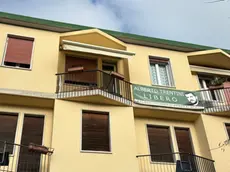 La casa di Alberto Trentini con le finestre abbassate