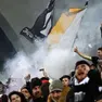 Tifosi bianconeri festeggiano durante la partita tra Udinese e Milan
