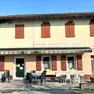 La facciata dell’osteria “Alla Passeggiata” di Pocenia, che festeggia 200 anni di attività