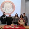 La consegna dei tre libri, da parte dei carabinieri, al dirigente scolastico dell’Istituto tecnico Zanon
