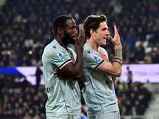 Udinese's Keinan Davis (L) celebrates with Udinese's Nicolo' Zaniolo after goal 0-2 during the Italian Serie A soccer match Atalanta BC vs Udinese Calcio at the New Balance Arena in Bergamo, Italy, 7 March 2026. ANSA/MICHELE MARAVIGLIA