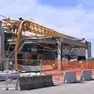 La gru a torre Potain MC 85 con braccio da 50 metri è ancora distesa sui capannoni di Udine Mercati. Resta da chiarire la causa del crollo ©Foto Petrussi