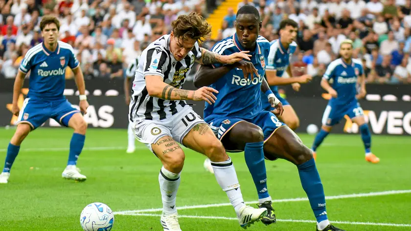 Zaniolo in azione contro il Como (foto Ansa)