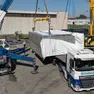 Le operazioni di carico sul camion della cassa, nello stabilimento della Mcn Foto Bonaventura